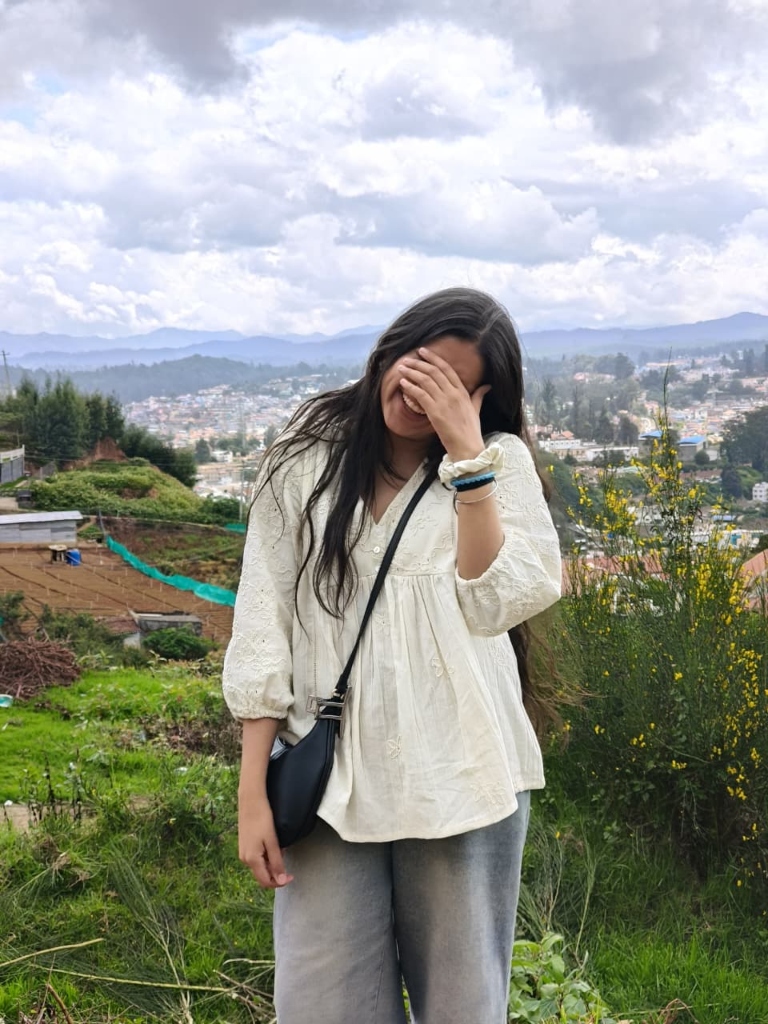 Pooja laughing in hills